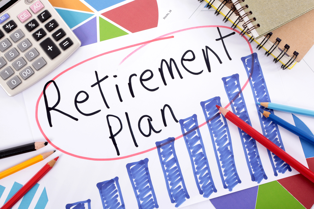 Retirement plan chart with office supplies